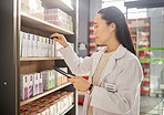 Pharmacy, inventory and Asian woman with tablet, checklist and healthcare medicine. Japanese female pharmacist, lady and medical professional with device, pills and update product information