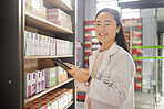 Pharmacist, tablet and portrait of Asian woman in pharmacy, shop or drugstore. Healthcare, medical professional and confident, happy or proud person from Japan with tech for research or telehealth.