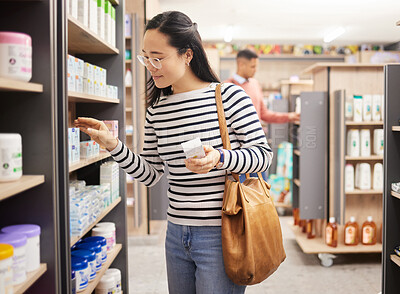 Asian woman, retail shopping and shelf in store for products, grocery stock and choice of brands. Female shopper, customer and supermarket aisle for groceries, sales decision and consumer buying 