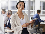 Happy, confidence and portrait of a businesswoman in the office with digital tablet for research. Happiness, smile and professional female employee working on project with mobile device in workplace.