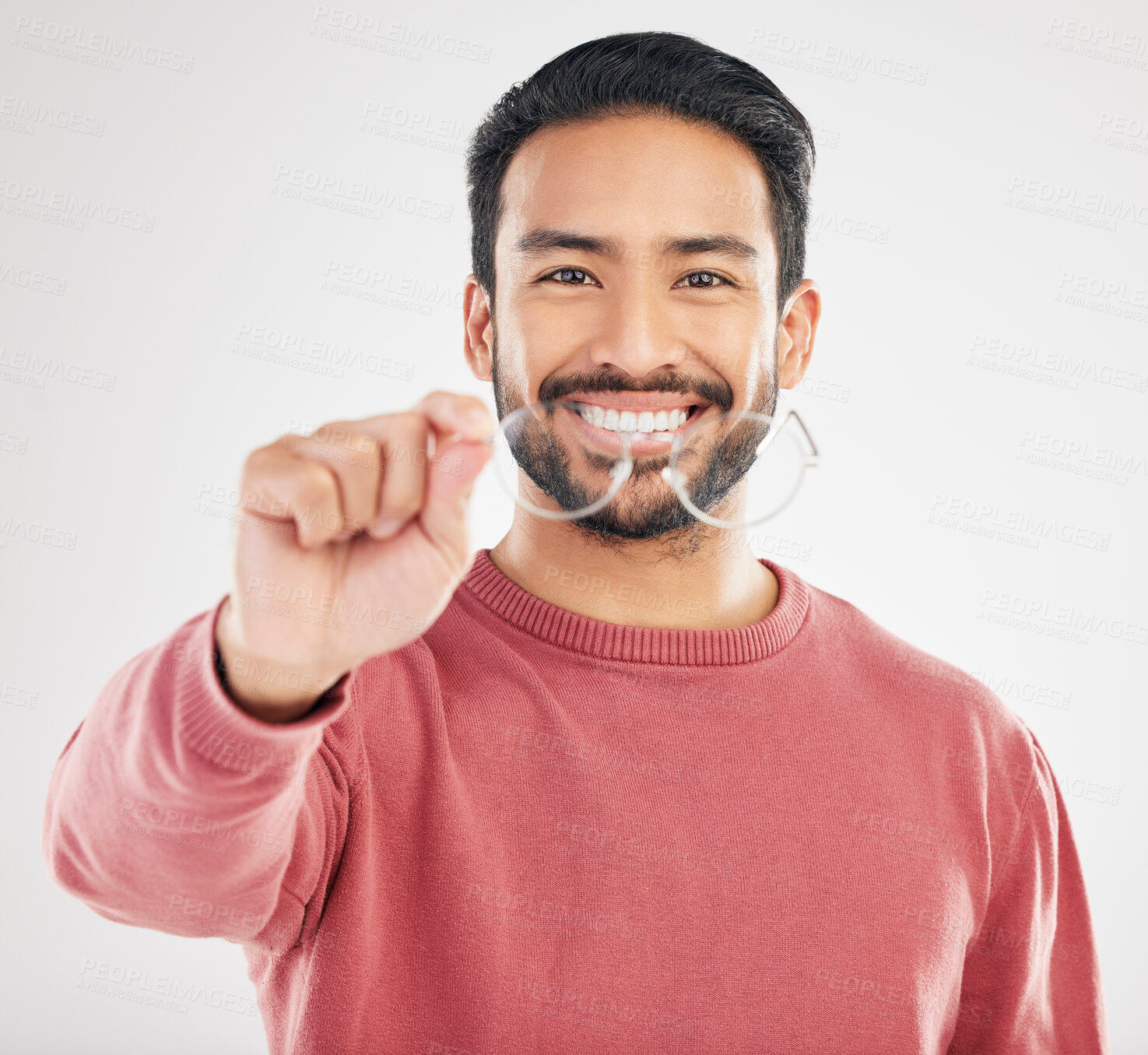 Buy stock photo Glasses, happy man and portrait in a studio with a smile from vision showing eye care product. Isolated, white background and happiness of a Asian male model with lens prescription and frame check