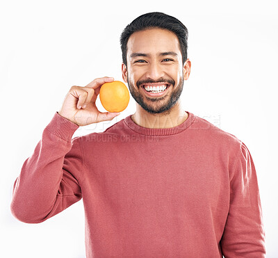 Buy stock photo Orange fruit, happy man and portrait in studio, white background and wellness of healthy food. Smile, male model and vitamin c citrus for nutrition, organic juice and detox diet of raw ingredients 