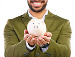 Smile, piggy bank in hands and businessman in studio with happy financial freedom and security savings. Happiness, Indian man with money box and saving by investing in small business startup plan.