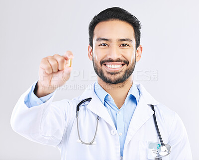 Buy stock photo Doctor portrait, studio pills or happy man with pharmaceuticals, drugs or medicine supplement. Healthcare support, medical pharmacy or male pharmacist with prescription medication on white background