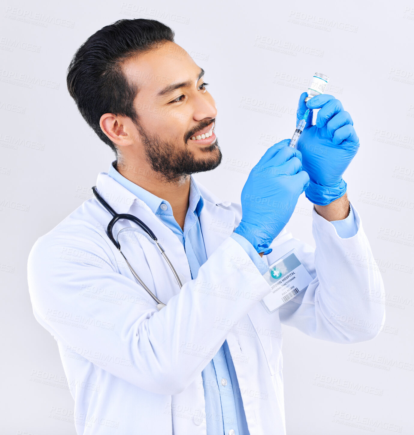 Buy stock photo Doctor with smile, syringe and vaccine in studio for healthcare, medicine and innovation in medical science. Vaccination, booster shot in bottle and needle, health care and help with virus protection