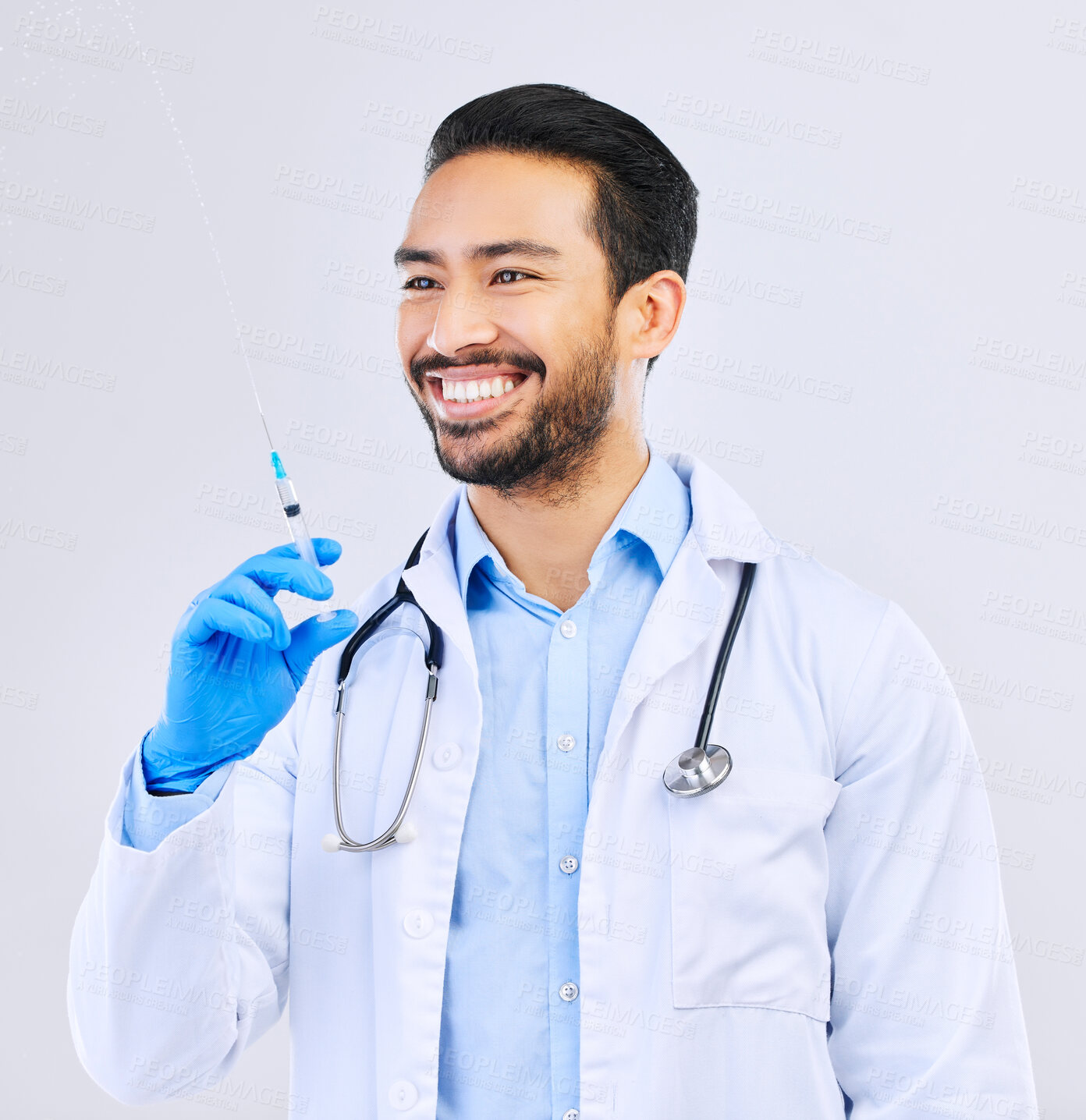 Buy stock photo Doctor with smile, syringe and vaccine in studio for healthcare, medicine and medical innovation. Vaccination, booster shot and happy Asian man with needle for virus protection on white background.