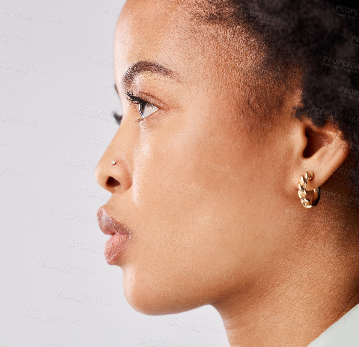 Buy stock photo Serious, side profile and face of a black woman isolated on a white background in a studio. Focus, thinking and an African girl looking thoughtful, contemplating and taking a headshot on a backdrop