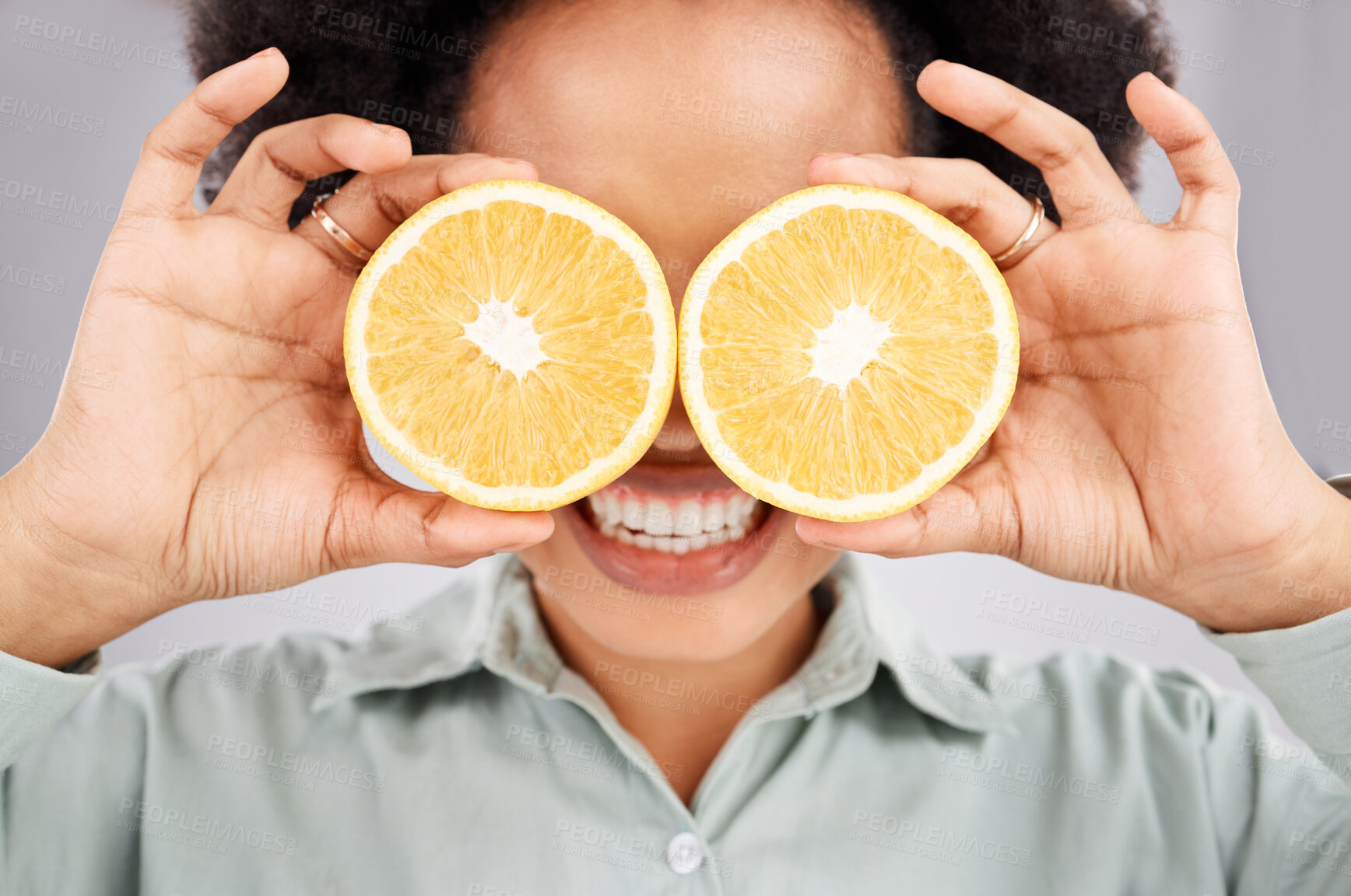 Buy stock photo Lemon eyes, health and face of black woman in studio for nutrition, wellness and healthy snack. Food, diet and girl smile with organic fruit for detox, vitamins and weight loss on white background