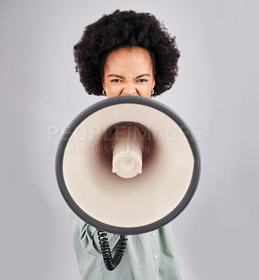 Buy stock photo Megaphone, protest and black woman shouting in portrait in studio isolated on a white background. Screaming, angry and person with loudspeaker protesting for change or justice, announcement or speech