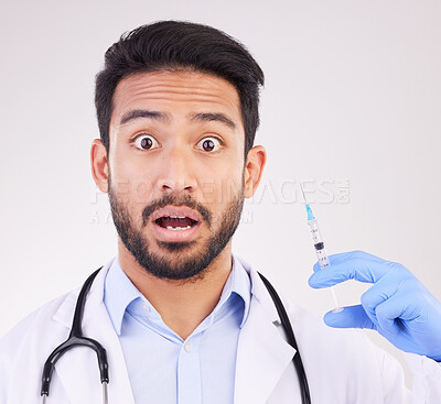 Buy stock photo Wow, portrait and doctor with vaccine, syringe and surprise in studio for healthcare innovation on white background. Omg, face and shocked guy health expert with needle for treatment or immunization 