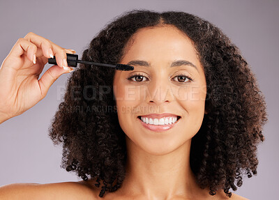 Buy stock photo Happy woman, face and smile in portrait with mascara, beauty and makeup with cosmetic product on studio background. Female, cosmetology and eyelash extension with brush, happiness and cosmetics glow