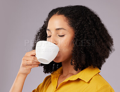 Buy stock photo Calm woman, coffee and drinking in studio, backdrop and background for warm beverage, latte and taste of espresso. Female model enjoying cup of tea, cappuccino and good mood for break, relax or peace