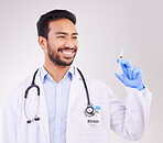 Healthcare, man and doctor with vaccine, injection or shot in studio against a white background. Medicine, vaccination and happy male expert with needle for medical, innovation or disease treatment