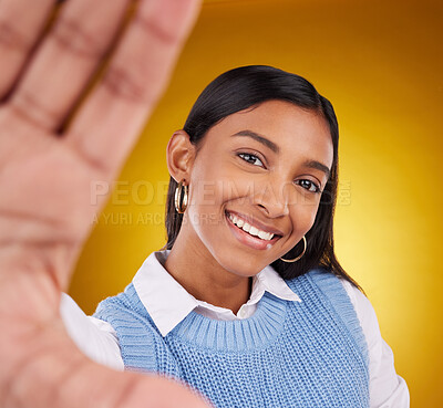 Buy stock photo Selfie, smile and portrait of Indian woman in studio for happiness, confident and cosmetics. Mockup, fashion and face of girl with hand frame in makeup, trendy clothes and happy on yellow background