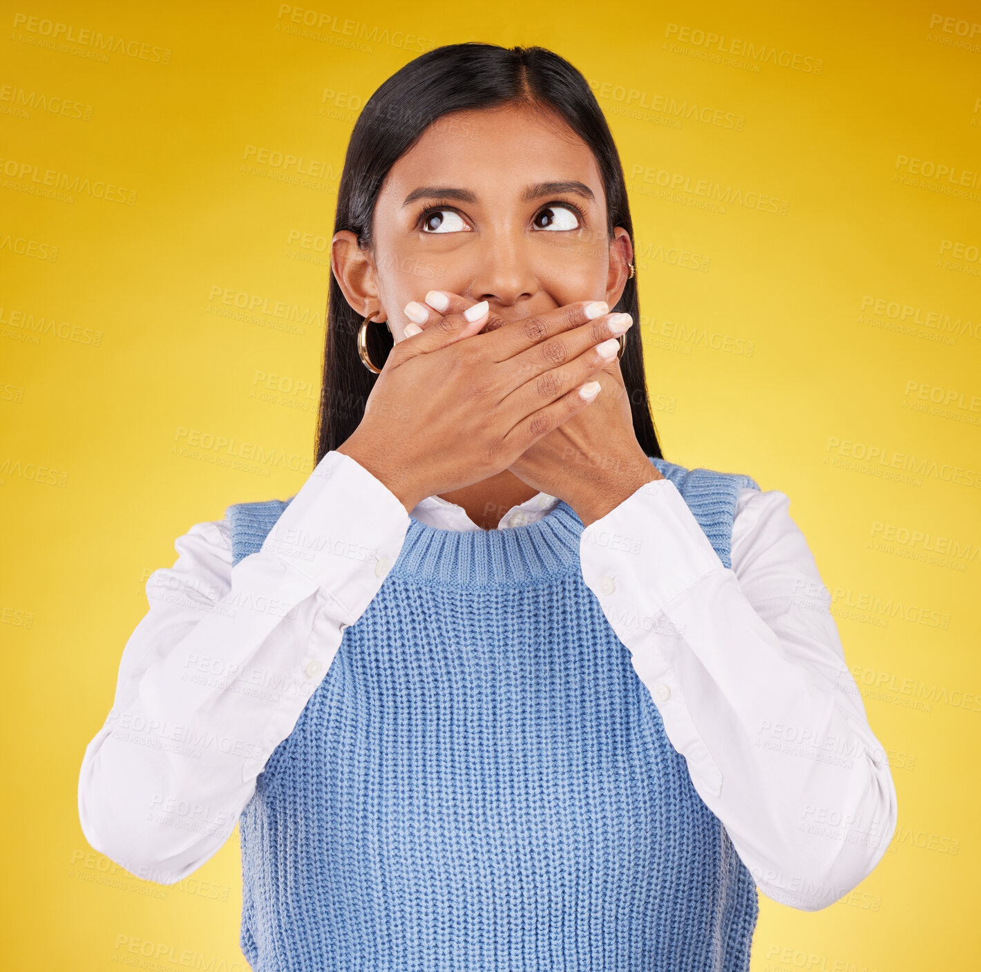 Buy stock photo Shock, omg and young female in a studio with her hand on her mouth for a wtf expression. Shocked, ecstatic and Indian woman model with wow or surprise face for good news isolated by yellow background