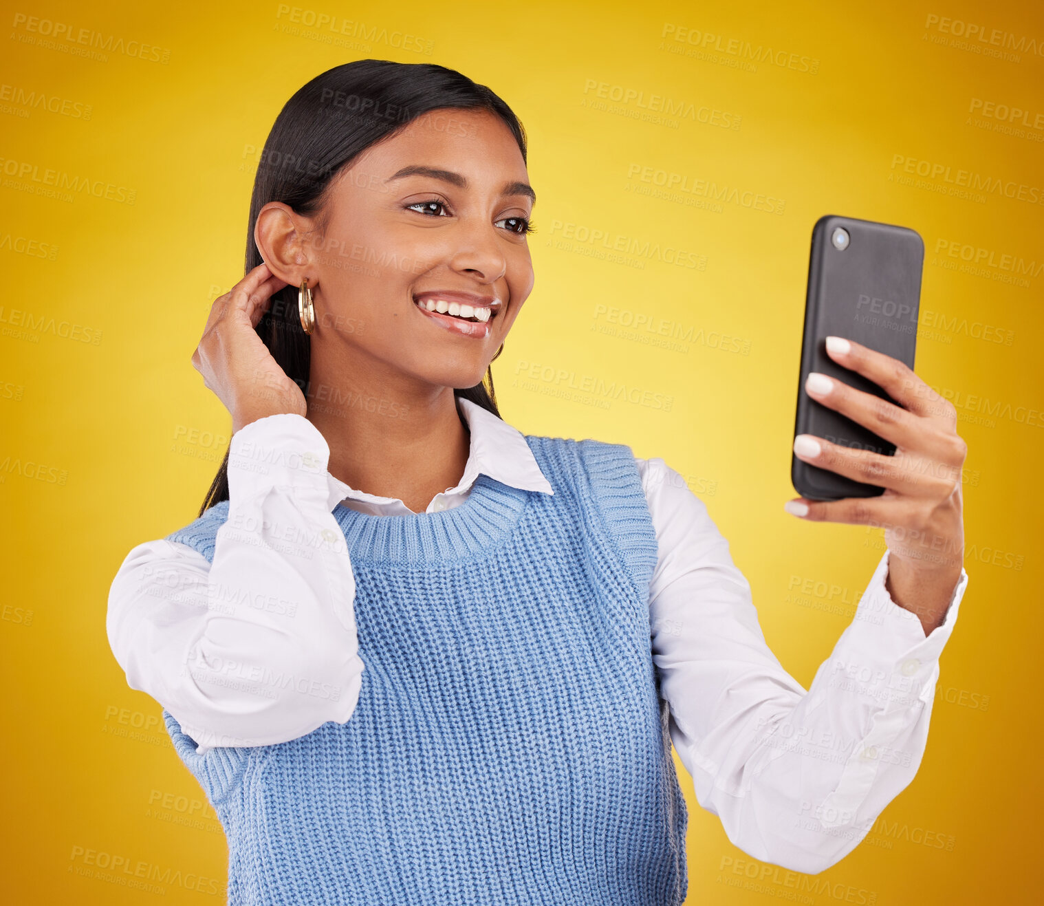 Buy stock photo Happy, pose and selfie with woman in studio for social media, technology and internet post. App, online and picture with female on yellow background for happiness, connection and photography