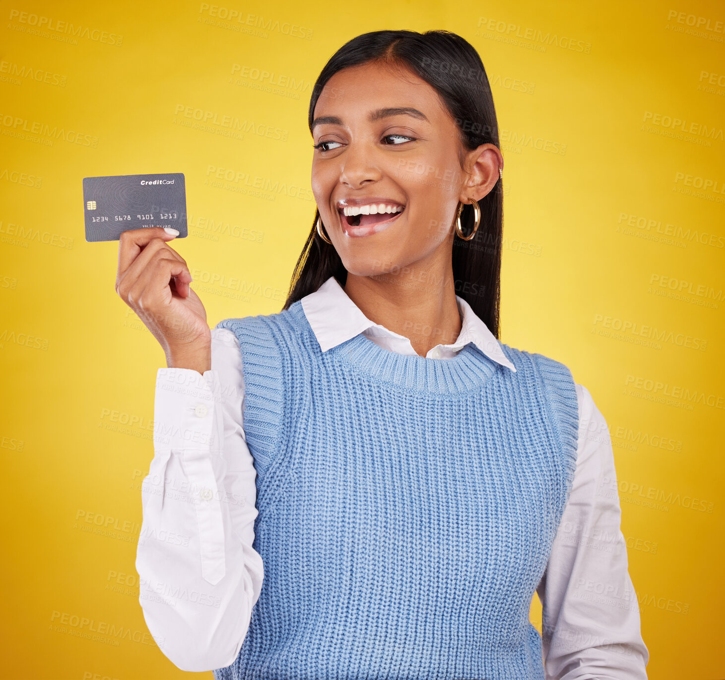 Buy stock photo Credit card, excited and Indian woman on yellow background for bank, investment and payment in studio. Banking mockup, finance and happy girl with plastic for budget, commerce and promotion purchase