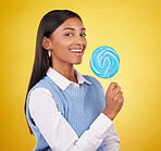 Smile, lollipop and candy with portrait of woman in studio for sweets, snack and food. Treats, dessert and sugar confectionery with female isolated on yellow background for diet, eating and hiding 