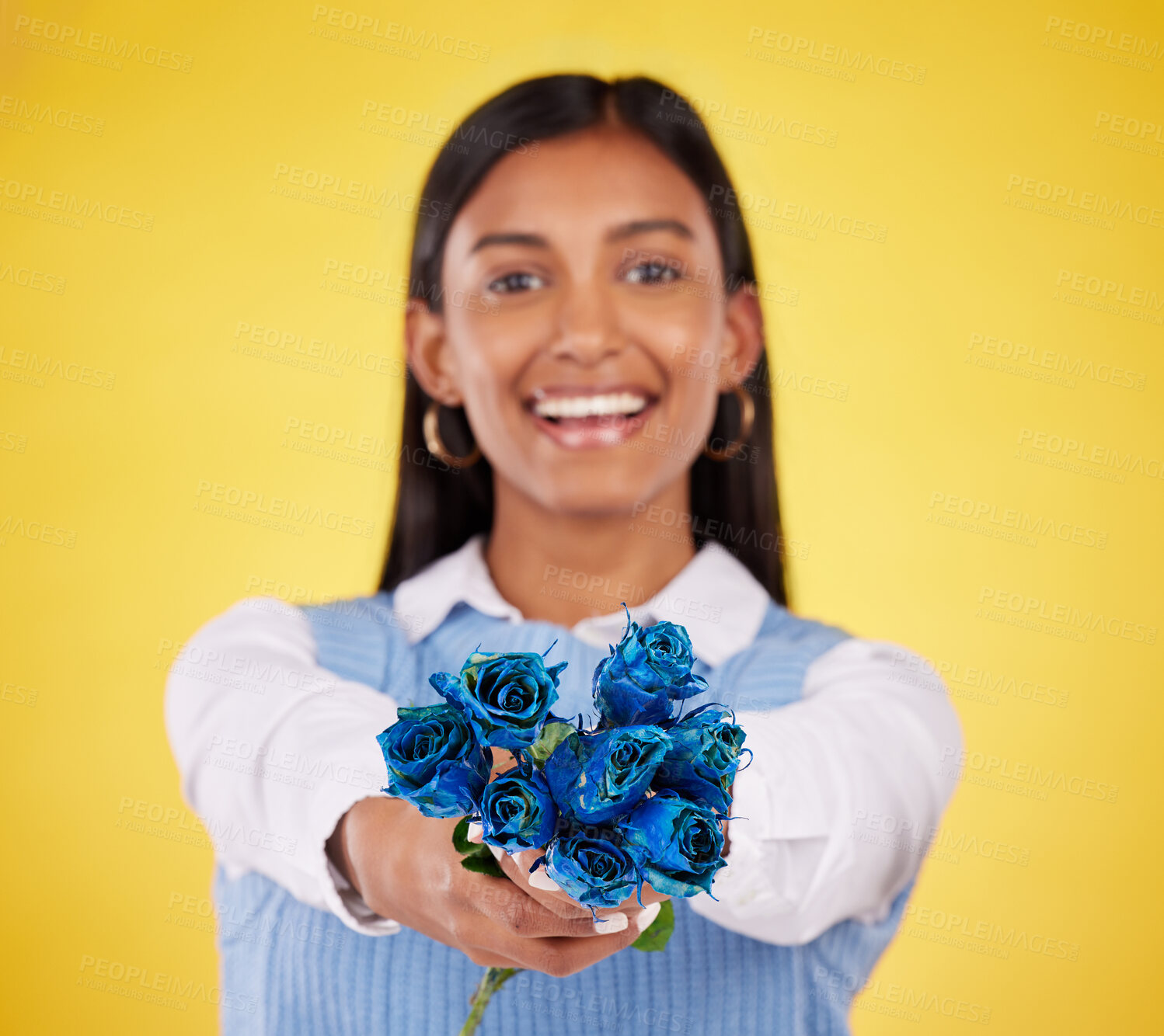 Buy stock photo Portrait, love and roses with a woman on a yellow background in studio for valentines day. Face, blue flowers or smile with a happy young female holding a plant for romance or anniversary celebration