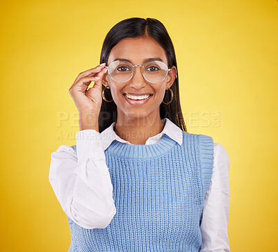 Buy stock photo Glasses, happy and portrait of woman in studio for eyewear, vision and confidence. Optometry, nerd and happiness with female and spectacles isolated on yellow background for pride, young and eye care