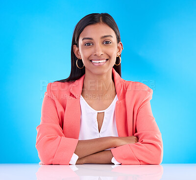 Buy stock photo Confident, leader and portrait of business woman with smile feeling happy isolated in a studio blue background. Confidence, young and Indian female corporate proud with arms crossed in backdrop