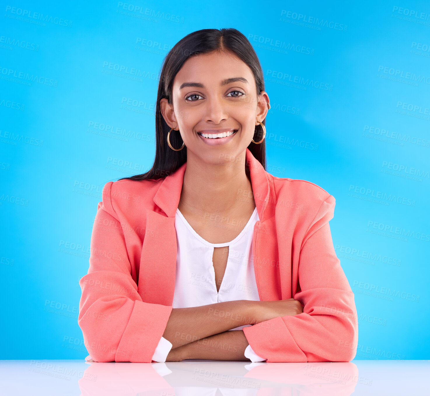 Buy stock photo Confident, leader and portrait of business woman with smile feeling happy isolated in a studio blue background. Confidence, young and Indian female corporate proud with arms crossed in backdrop