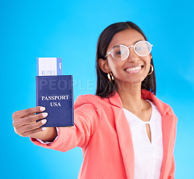 Buy stock photo Passport, ticket and portrait of woman in travel, flight or USA documents against a blue studio background. Happy female business traveler smile holding international boarding pass or booking trip
