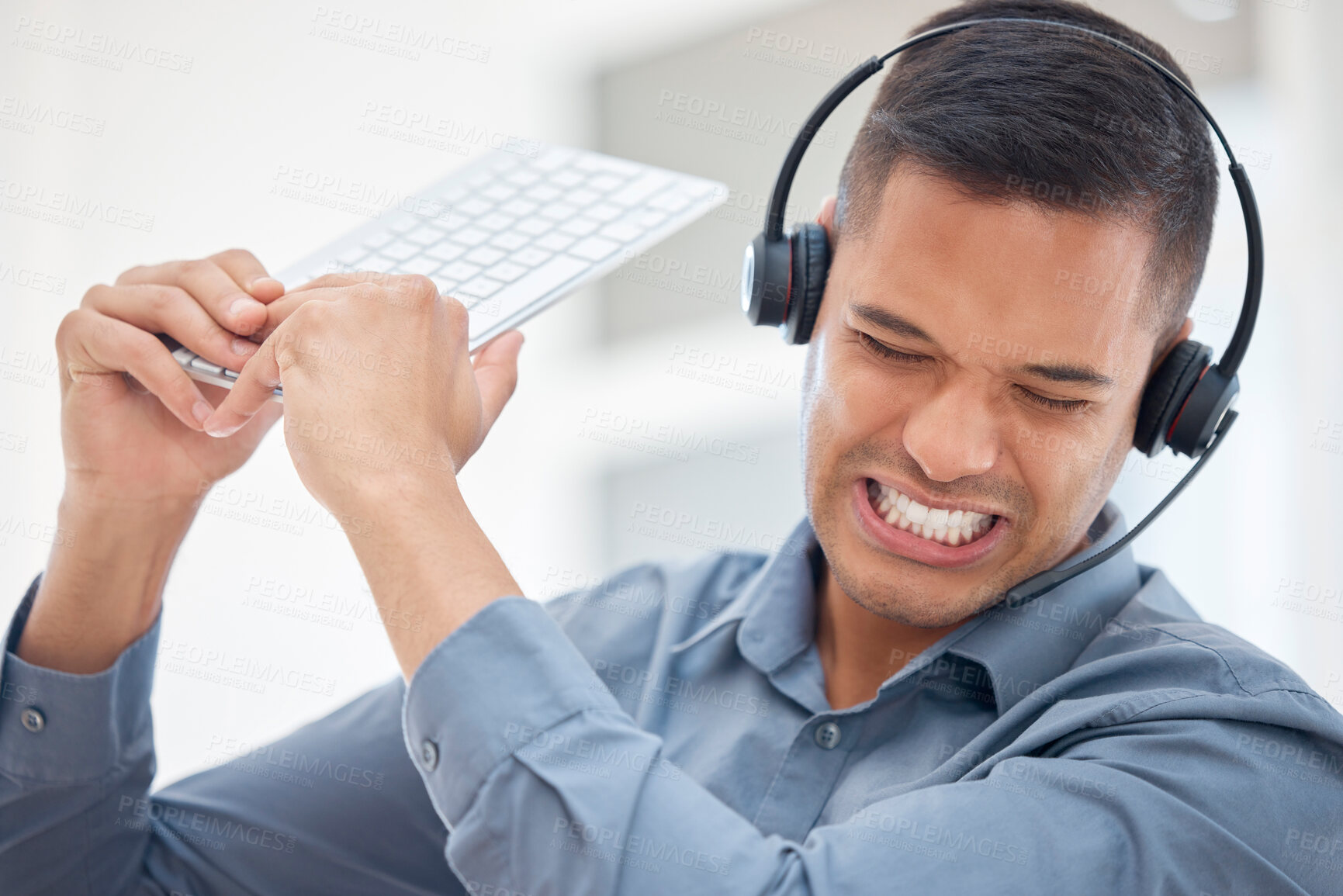 Buy stock photo Stress, frustrated or angry man in call center breaking computer keyboard in crm consulting fail or 404 glitch. Anger problem, crazy screaming or mad customer services agent in technology smash