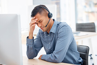 Buy stock photo Headache, migraine pain or man in call center with burnout feeling overworked in crm communication. Stressed, office or tired telemarketing sales agent with anxiety, fatigue or mental health problems