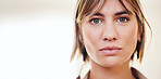 Beauty, serious and portrait of a woman in a studio with a positive and confidence mindset. Beautiful, young and headshot of female model from Mexico standing by a blurry background with mockup space