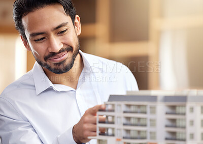 Buy stock photo Architect, man and check building model, construction with smile on face and architecture project. Businessman in office, design and engineer with property development company and construction job