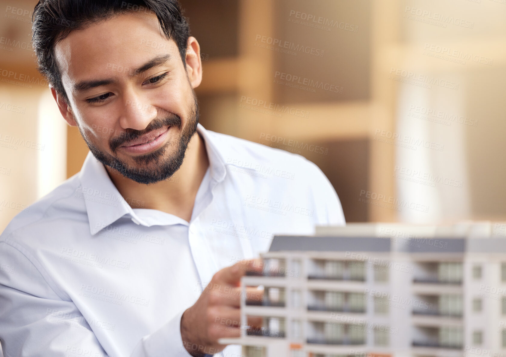 Buy stock photo Architect, man and check building model, construction with smile on face and architecture project. Businessman in office, design and engineer with property development company and construction job