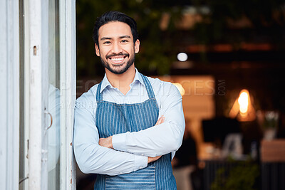 Buy stock photo Asian man, portrait smile and arms crossed in small business at restaurant for welcome, service or job at door. Happy male entrepreneur in confidence at entrance ready to serve in coffee shop or cafe