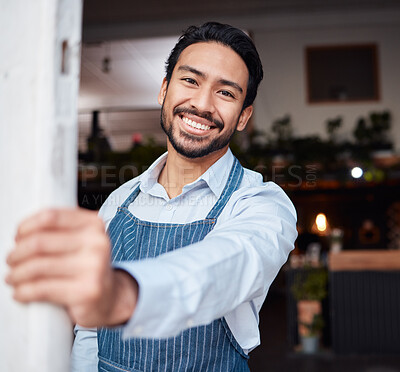 Buy stock photo Happy, portrait and male entrepreneur of a cafe standing by the door to welcome customers. Confident, proud and face of a young man small business owner with success at his modern startup coffee shop