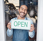 Asian man, small business and face with open sign on window for service in coffee shop or restaurant. Portrait of happy male entrepreneur holding billboard or poster for opening, retail store or cafe