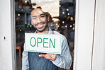 Asian man, small business and portrait with open sign on window for service in coffee shop or restaurant. Happy male entrepreneur holding billboard, poster or welcome for opening retail store or cafe