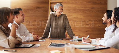 Buy stock photo Senior woman, laughing or business people in meeting speaking, planning or sharing funny joke together. Group collaboration, diversity or happy designers with manager talking about ideas or strategy