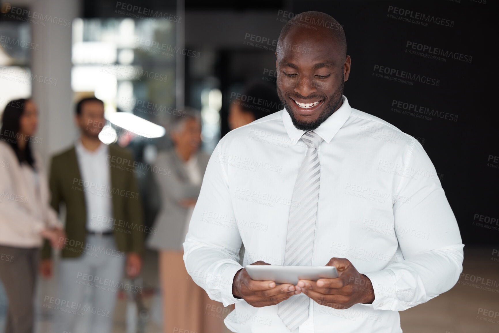 Buy stock photo Digital tablet, happy and black man with team in office for meeting, planning or coworking schedule. Cheerful, smile and male leadership online with group of business people for startup mission or