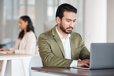Buy stock photo Focused business man typing on laptop at office desk, planning information and digital tech project. Male employee working on computer for data update, website strategy and research for online report