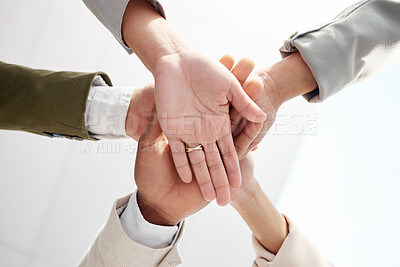 Buy stock photo Business people, hands together and solidarity with team support, low angle and motivation in office. Success, collaboration and corporate group with teamwork, professional community and workforce