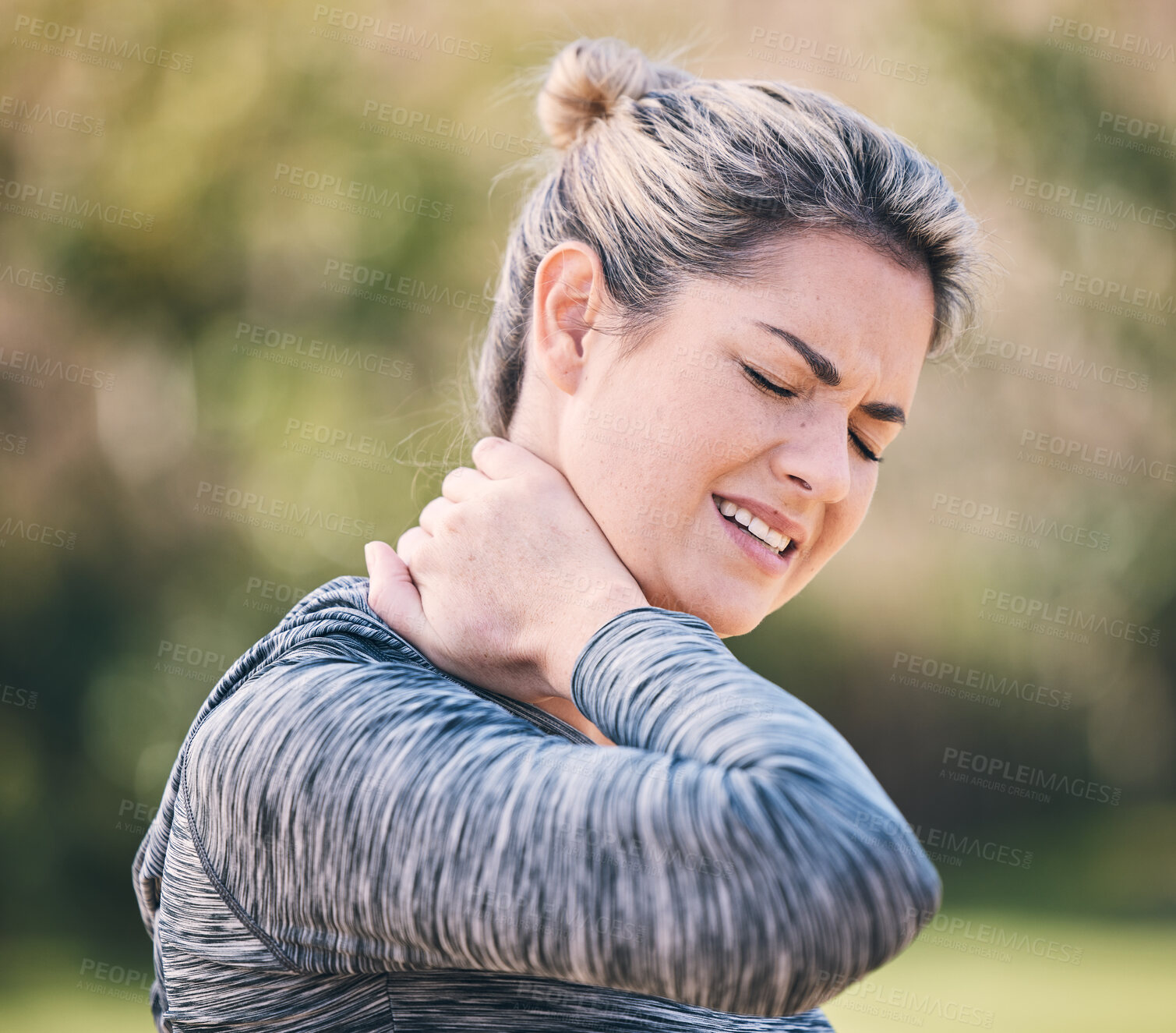 Buy stock photo Fitness, injury and woman with neck pain in a park during running routine on blurred background. Spine, problem and girl suffering from injured muscle, arthritis or shoulder strain after workout run