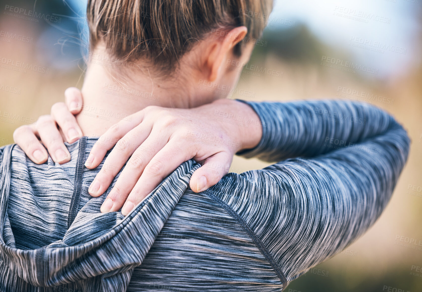 Buy stock photo Fitness, injury and back pain by woman in a park during running routine on blurred background. Neck, problem and girl suffering from injured muscle, arthritis or shoulder strain after workout run