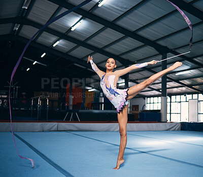 Ribbon, gymnastics and portrait of woman balance in performance, dance training and sports competition. Female, rhythmic movement and flexible dancing athlete, action and creative talent in arena