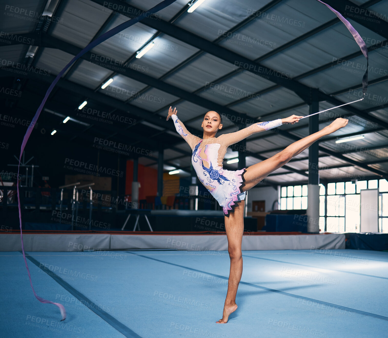 Buy stock photo Ribbon, gymnastics and portrait of woman balance in performance, dance training and sports competition. Female, rhythmic movement and flexible dancing athlete, action and creative talent in arena 