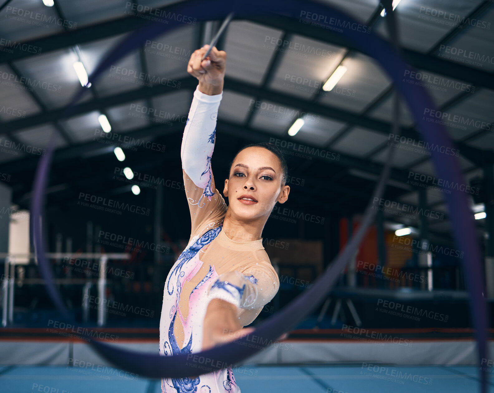 Buy stock photo Ribbon, gymnastics and portrait of woman in action, dance performance and sports competition. Female, rhythmic movement and dancing athlete with creative talent, concert event and practice arena 