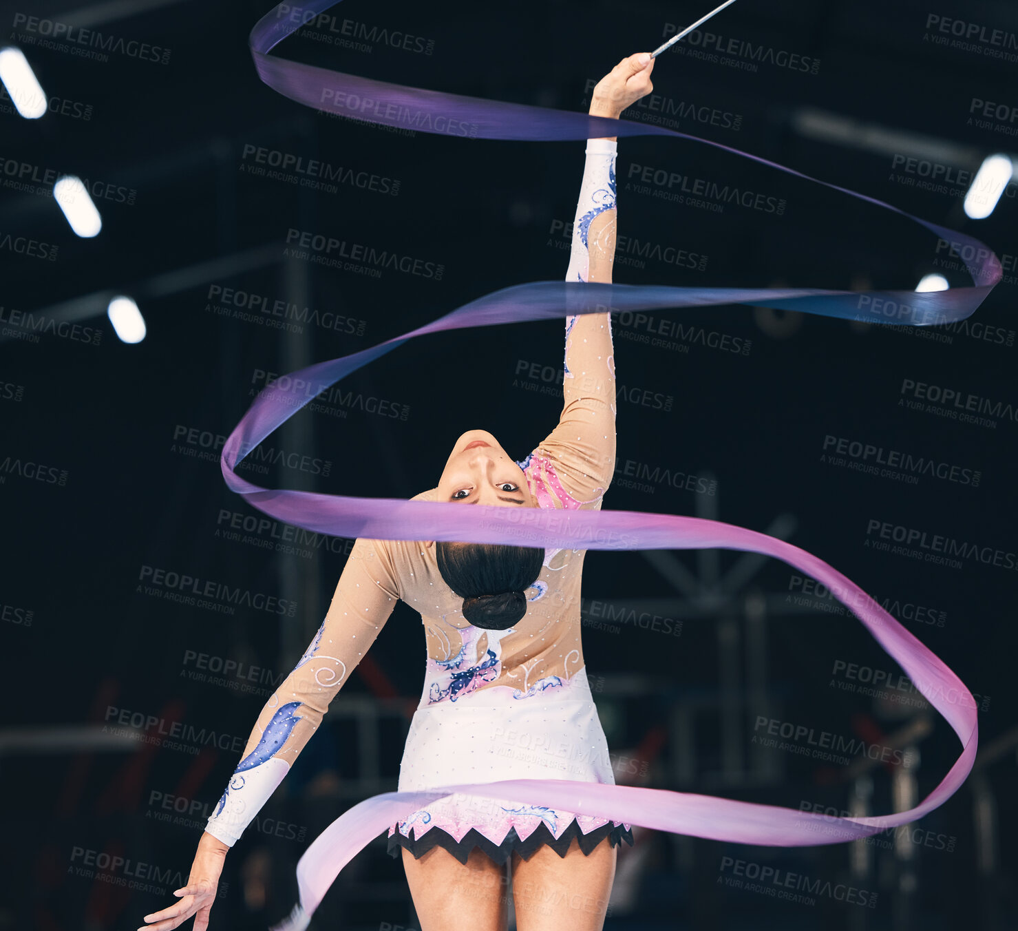 Buy stock photo Ribbon gymnastics, flexible woman and dancing in performance, training and competition from the back. Female dancer, rhythmic movement and elegant action of creative talent, sports and concert event