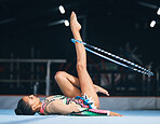 Woman, gymnastics and spinning hoop on leg for competition, sports training and action in arena. Female dancer, rhythmic movement and athlete with loop for creative solo concert, event or performance