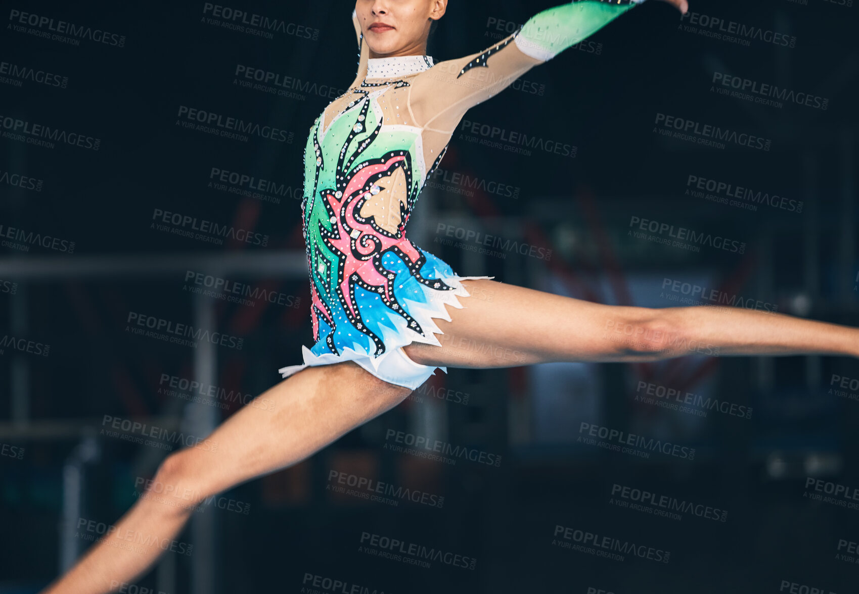 Buy stock photo Gymnastics, fitness and zoom on woman jumping in arena for competition, exercise and training with mockup space. Sports, movement and jump, professional gymnast with form and balance in performance.