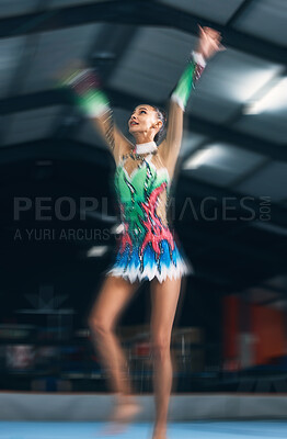 Woman, gymnastics and motion blur in gym for performance, training and dancer with creativity in contest. Female gymnast, athlete and dance for workout, sports and wellness with balance, art or focus