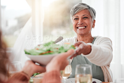 Buy stock photo Family dinner, senior woman and healthy salad of a happy female with food in a home. Celebration, together and people with unity from eating at table with happiness and a smile in a house giving meal